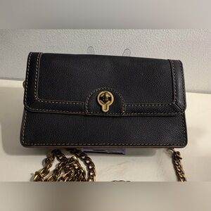 Fossil Ainsley wallet on chain in black leather with gold-tone hardware.